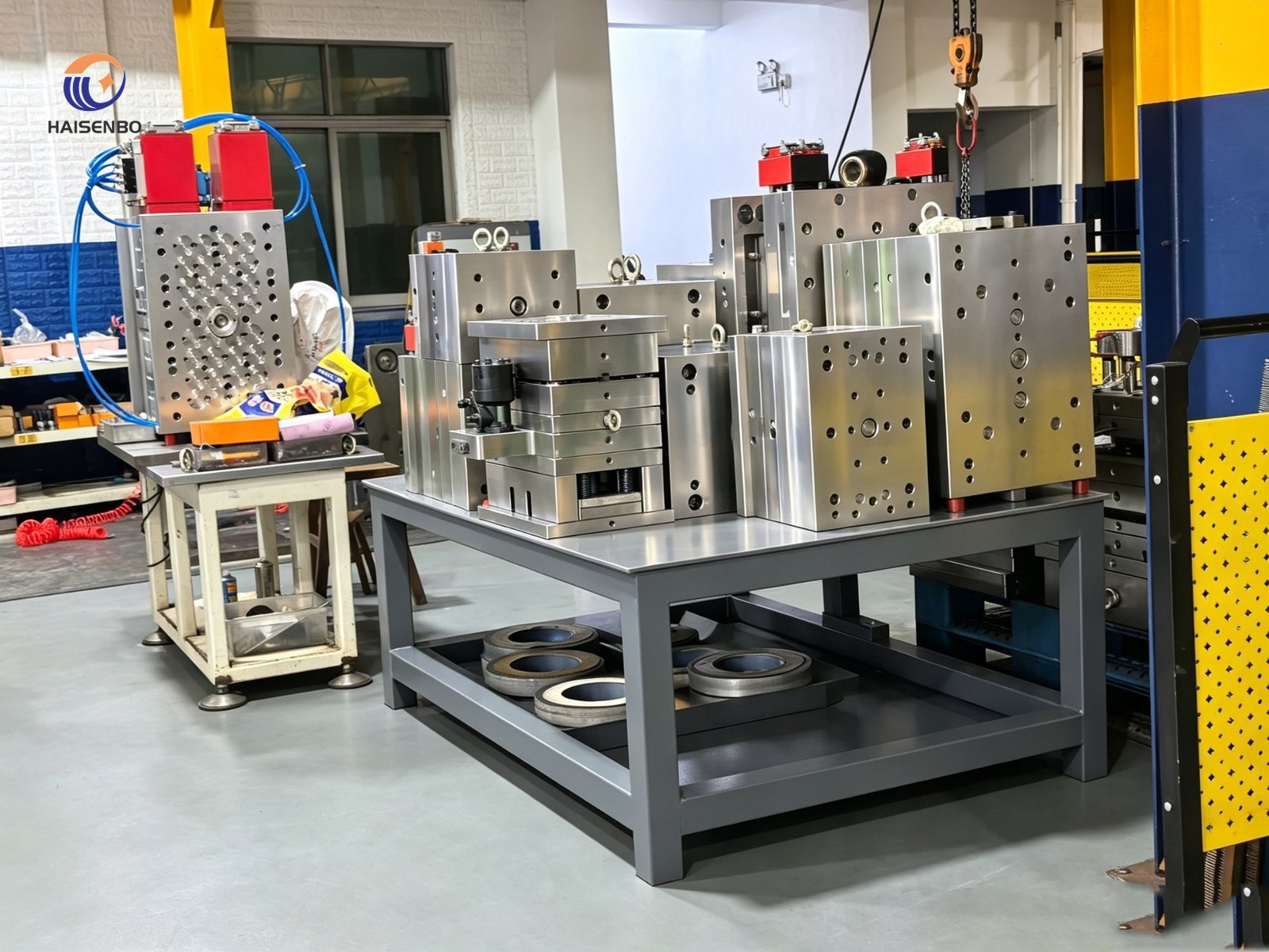 Multiple injection molds in final assembly at the Haisenbo workshop