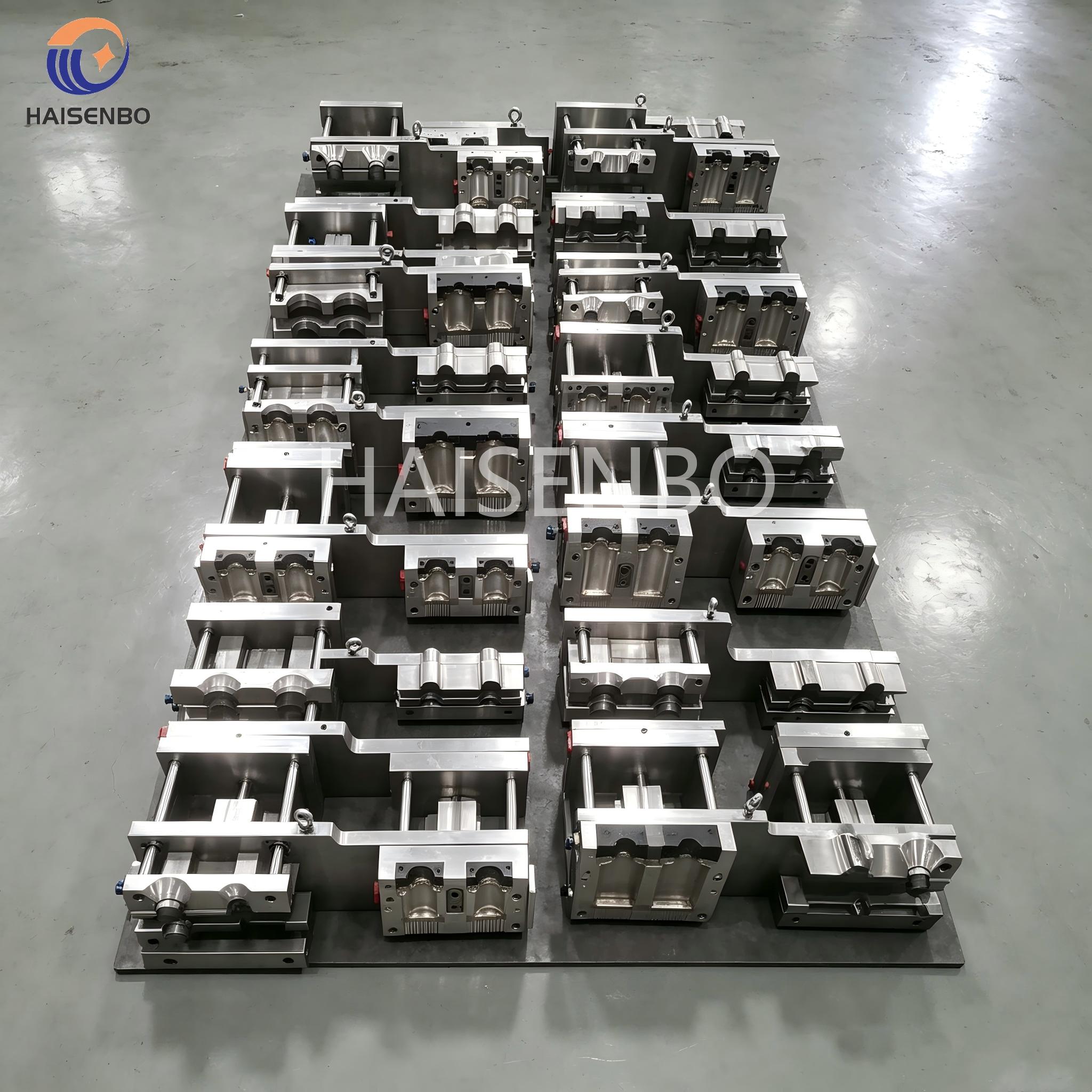 Full set of Haisenbo blow mold halves laid out for inspection